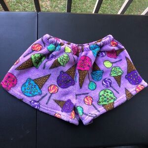 “Fuzzies by confetti” Purple colorful rainbow ice cream fleece shorts